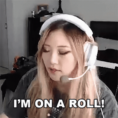 Woman With Headphones Saying I'm On A Roll GIF