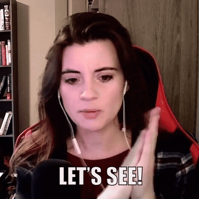 Woman With Headphones Saying Let's See At Bookshelf GIF
