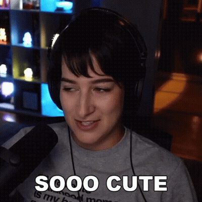 Woman With Headphones Saying Sooo Cute GIF