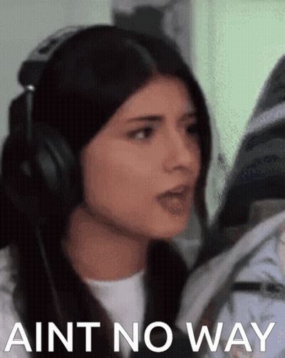 Woman With Headphones Says Ain't No Way In Front Of Clock GIF