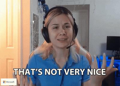 Woman With Headphones Says That's Not Very Nice Microsoft Logo GIF