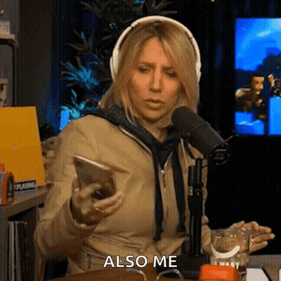 Woman With Headphones Sitting At Microphone GIF