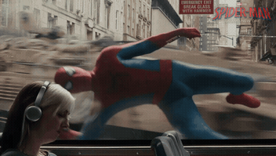 Woman With Headphones Watching Spider-Man Advertisement GIF