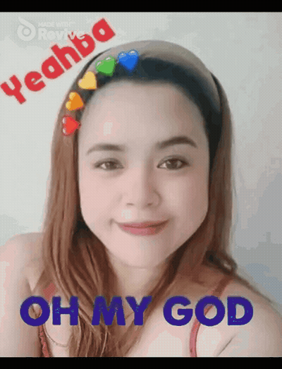 Woman With Heart Headband Smiles Says Oh My God GIF
