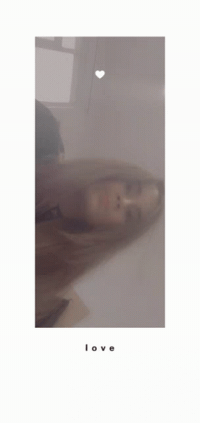 Woman With Heart On Nose Taking Selfie GIF