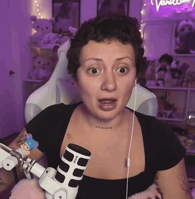Woman With Heaven Neck Tattoo In Front Of Rode Microphone GIF