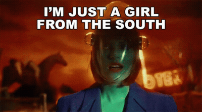 Woman With Helmet Says I'm Just A Girl From The South GIF