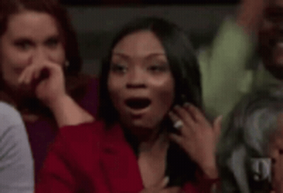 Woman With Hoop Earrings Looking Out Car Window GIF