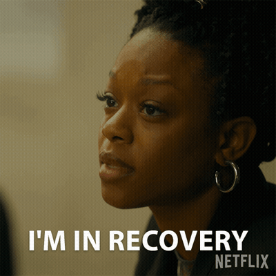 Woman With Hoop Earrings Says I'm In Recovery GIF