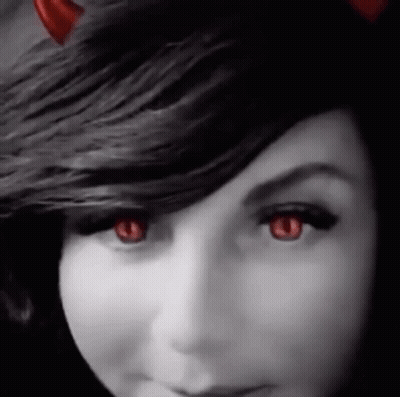 Woman With Horns And Red Eyes GIF