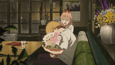 Woman With Horns Holding Bouquet GIF