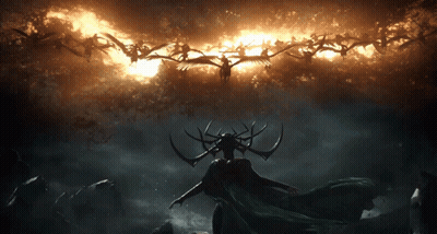 Woman With Horns Standing Before Angels GIF