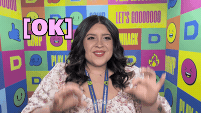 Woman With Lanyard Saying OK GIF