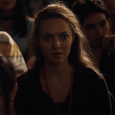 Woman With Lanyard Smiling GIF