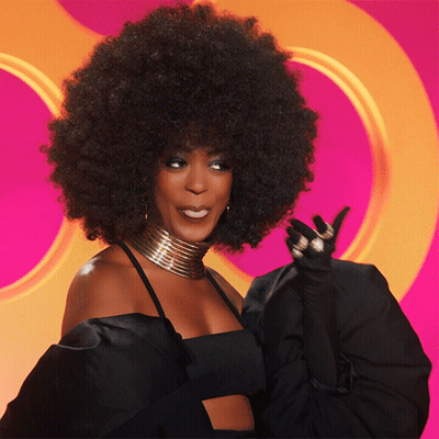 Woman With Large Afro In Black Dress GIF