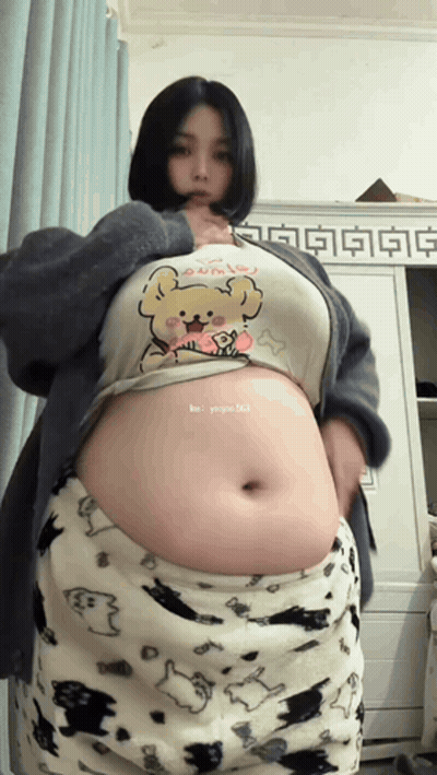 Woman With Large Belly In Teddy Bear Shirt GIF