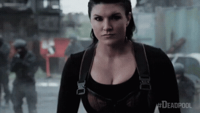 Woman With Large Breasts Standing GIF
