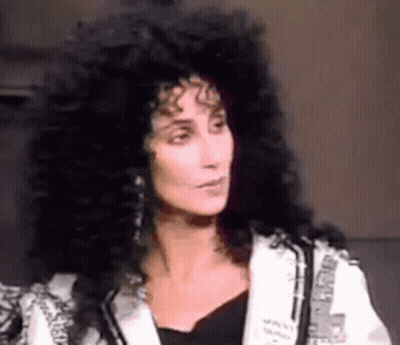 Woman With Long Black Hair And White Jacket GIF