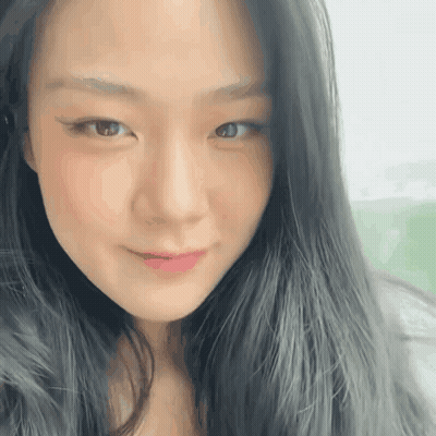 Woman With Long Black Hair Close Up GIF