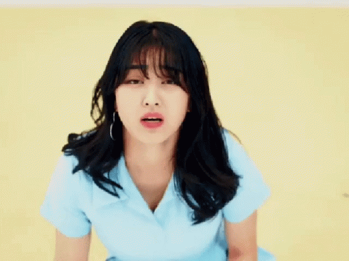 Woman With Long Black Hair In Blue Shirt GIF