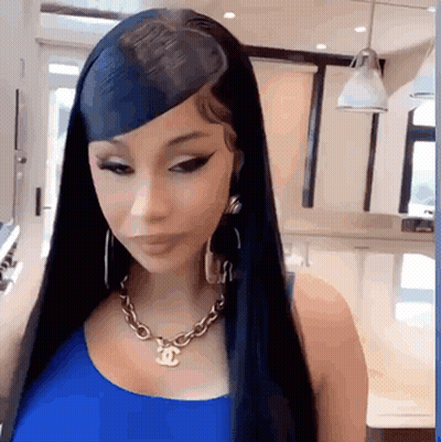 Woman With Long Black Hair In Blue Tank Top GIF