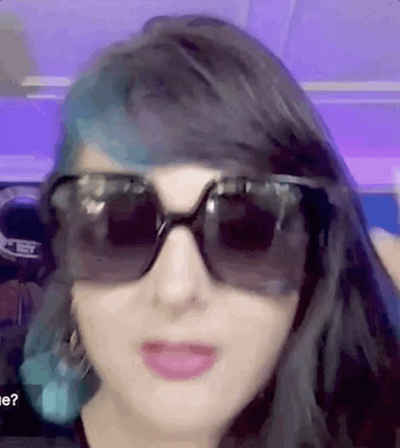 Woman With Long Black Hair In Sheer Top GIF
