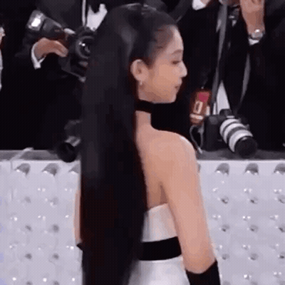 Woman With Long Black Hair In White Dress GIF