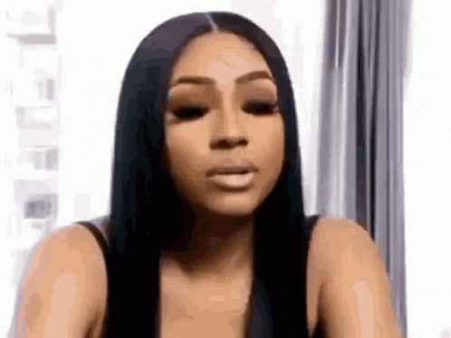 Woman With Long Black Hair Making Funny Face GIF