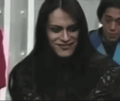 Woman With Long Black Hair Making Funny Face GIF