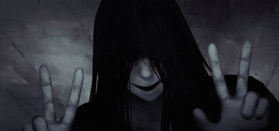 Woman With Long Black Hair Making Peace Sign GIF