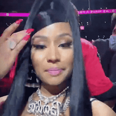 Woman With Long Black Hair Red Nails Wearing Necklace Saying SDD GIF