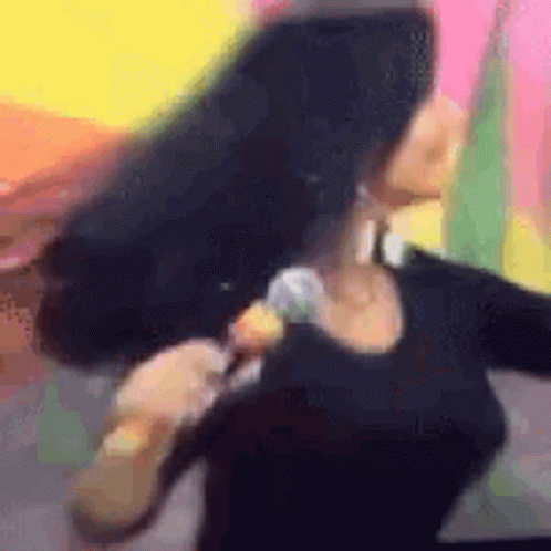 Woman With Long Black Hair Singing GIF