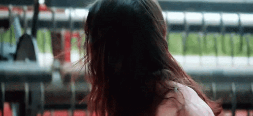Woman With Long Black Hair Standing GIF