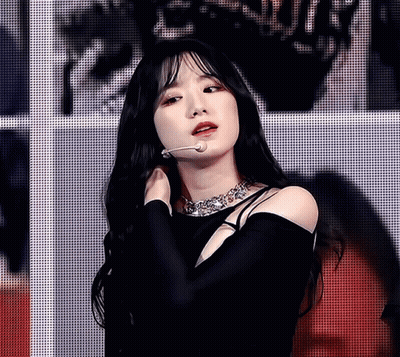 Woman With Long Black Hair Wearing Necklace GIF