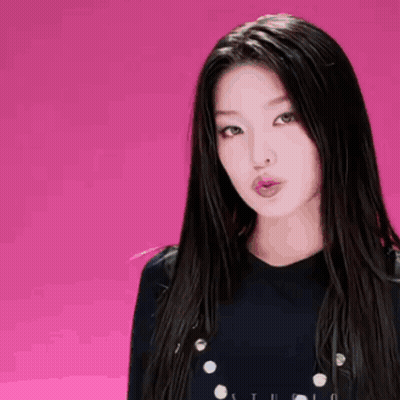 Woman With Long Black Hair Wearing Studio Shirt GIF