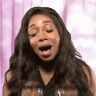 Woman With Long Black Hair Yawning GIF