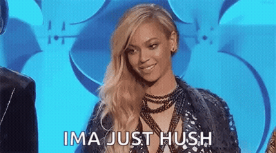 Woman With Long Blonde Hair Against Blue Background GIF