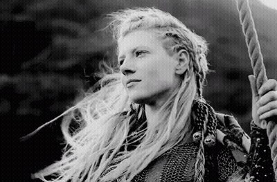 Woman With Long Blonde Hair Holding Rope GIF