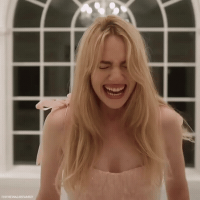 Woman With Long Blonde Hair Laughing Eyes Closed GIF