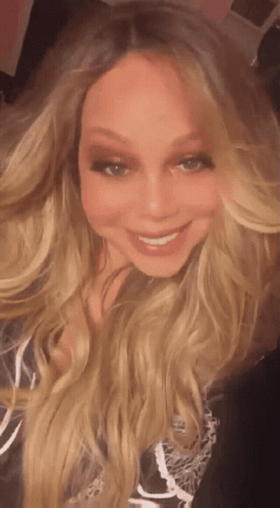 Woman With Long Blonde Hair Smiling GIF