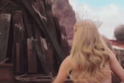 Woman With Long Blonde Hair Standing GIF