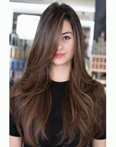 Woman With Long Brown Hair And Black Shirt In Salon GIF