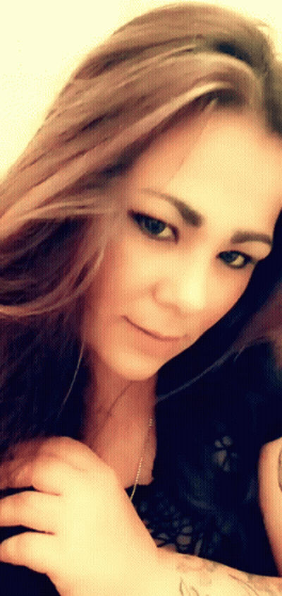 Woman With Long Brown Hair And Tattoo GIF