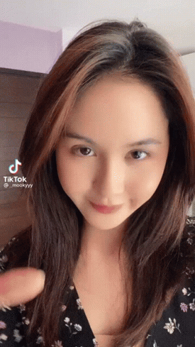 Woman With Long Brown Hair Making Funny Face GIF