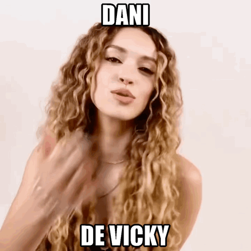 Woman With Long Curly Hair And Dani De Vicky On Face GIF