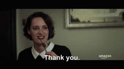 Woman With Long Curly Hair Before Men GIF