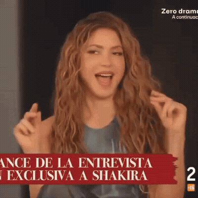 Woman With Long Curly Hair Making Funny Face GIF