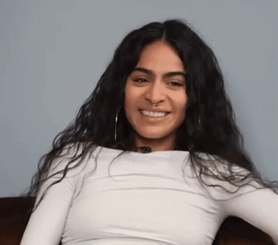 Woman With Long Dark Hair And Nose Ring Smiling GIF