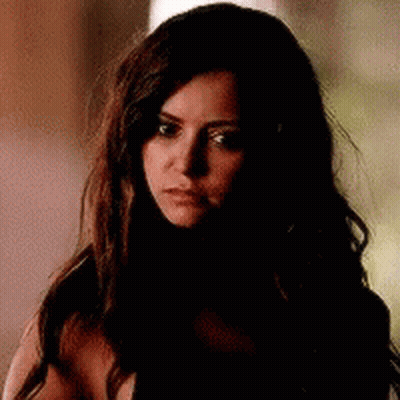Woman With Long Dark Hair Close Up GIF