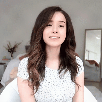 Woman With Long Dark Hair In White Shirt GIF